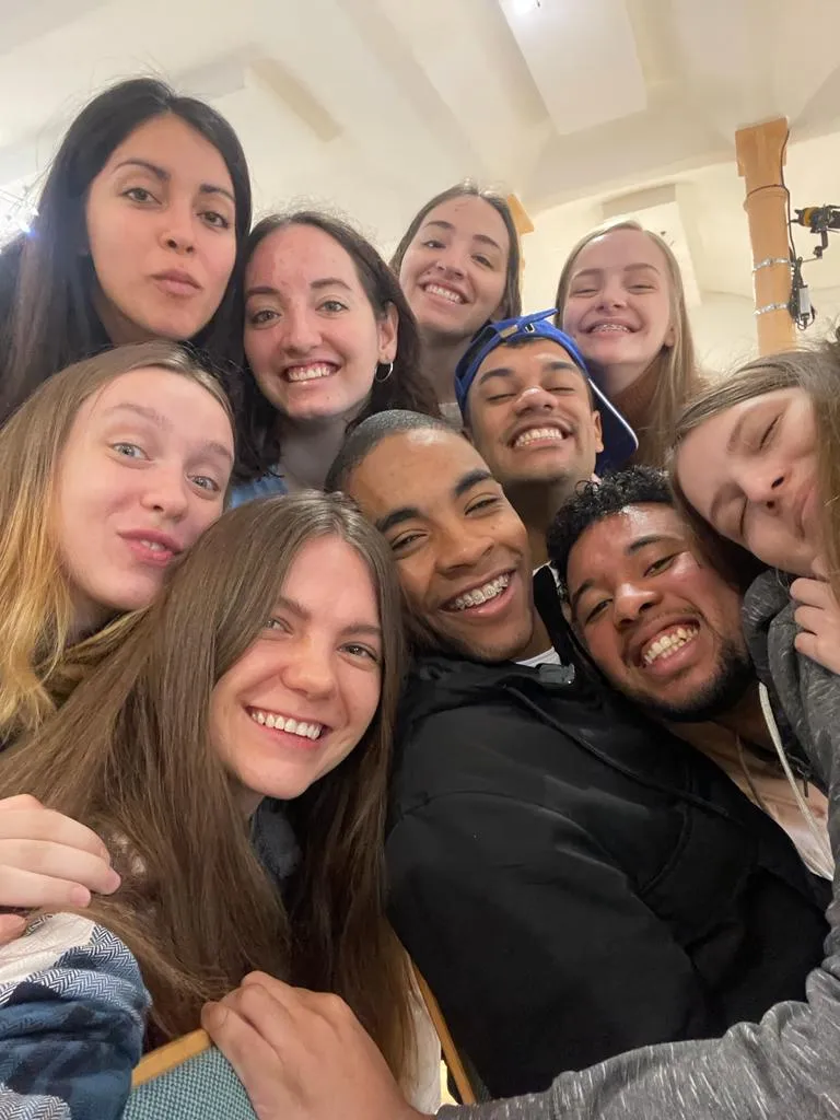 Group selfie of 10 people